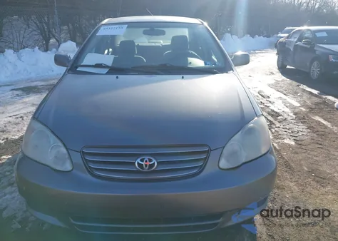 2004 Toyota Corolla Le z USA, uszkodzony, nr VIN 2T1BR32E84C181854